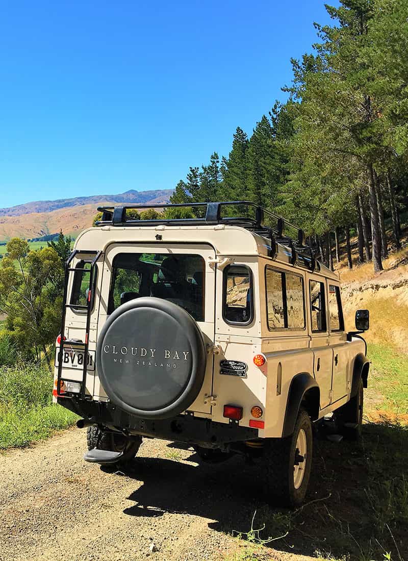 Cloudy Bay-branded Land Rover on gravel path